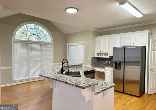 Photo 4 of Single family home for sale at 1244 Hadaway Ct NE, Lawrenceville, GA 30043 | MLS# 10811256 | Listing updated on 2026-09-20