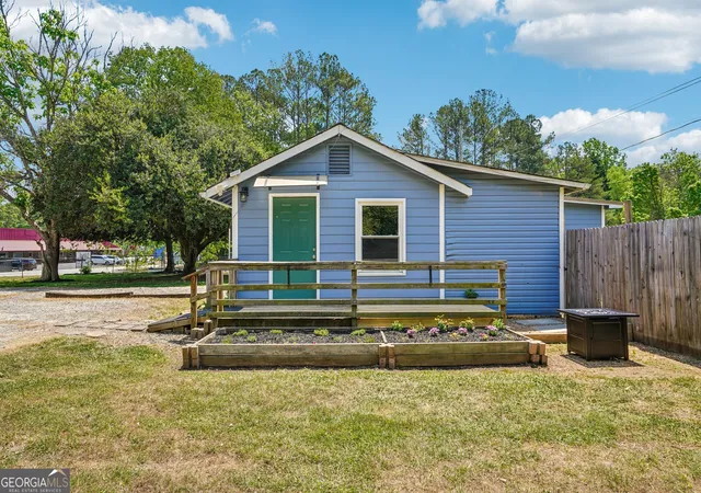 Photo 2 of Single family home for sale at 1042 Main St, Whitesburg, GA 30185 | MLS# 10741685 | Listing updated on 2026-08-21