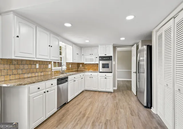 Photo 2 of Sale Pending at 1741 Beauregard Dr Sw, Lilburn, GA 30047 | MLS# 10833199 | Listing updated on 2026-10-10