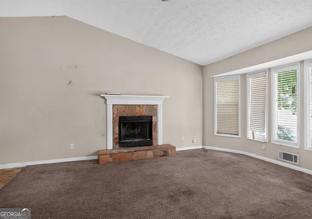 Photo 3 of Single family home for sale at 6409 Eastbriar Dr, Lithonia, GA 30058 | MLS# 10809367 | Listing updated on 2026-08-13