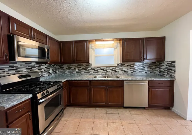 Photo 2 of Single family home for sale at 5328 Ridge Forest Dr, Stone Mountain, GA 30083 | MLS# 10697128 | Listing updated on 2026-09-18