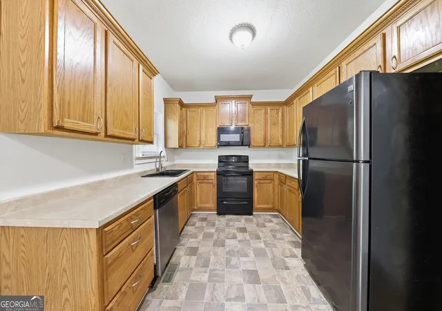 Photo 2 of Sale Pending at 117 E Woodland Manor, Temple, GA 30179 | MLS# 10772907 | Listing updated on 2026-09-16