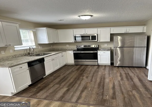 Photo 3 of Single family home for sale at 411 Kara Ln, Mcdonough, GA 30253 | MLS# 10832684 | Listing updated on 2026-10-23