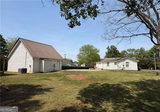 Photo 2 of Single family home for sale at 5919 River Rd, Flowery Branch, GA 30542 | MLS# 10784941 | Listing updated on 2026-09-23