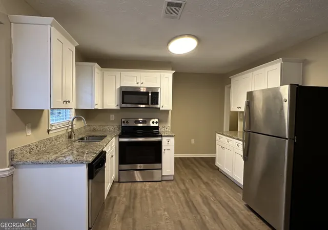 Photo 4 of Single family home for sale at 245 Remington Trl, Ellenwood, GA 30294 | MLS# 10418071 | Listing updated on 2026-09-19