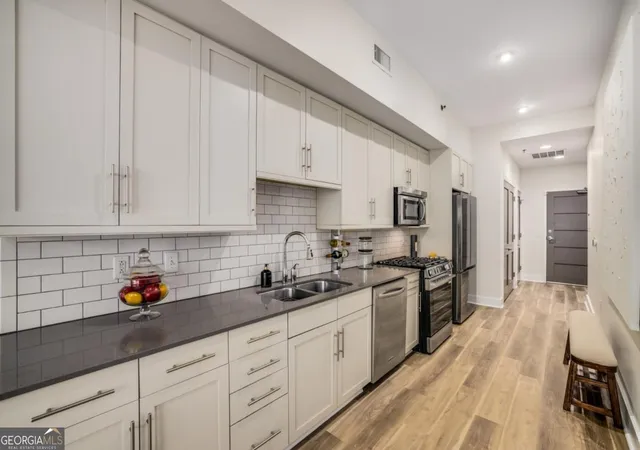 Photo 2 of Condo for sale at 1100 Howell Ml Rd NW #202, Atlanta, GA 30318 | MLS# 10812280 | Listing updated on 2026-08-07