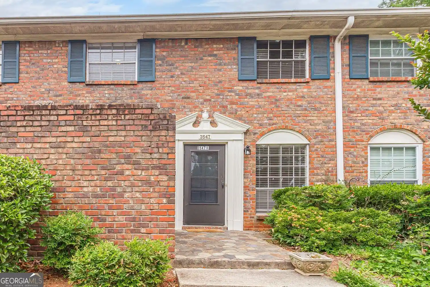 Listing Photo 1 - Condo for sale in 3547 Old Chamblee Tucker Rd located at 3547 Old Chamblee Tucker Rd, Doraville, GA 30340 - Unit 3547 Old Chamblee Tucker Rd