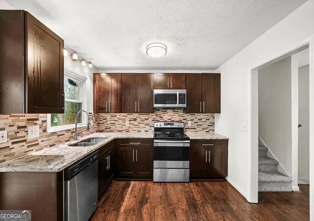 2nd image of 1469 W Rock Ct, Stone Mountain, GA 30088 | MLS# 10790003