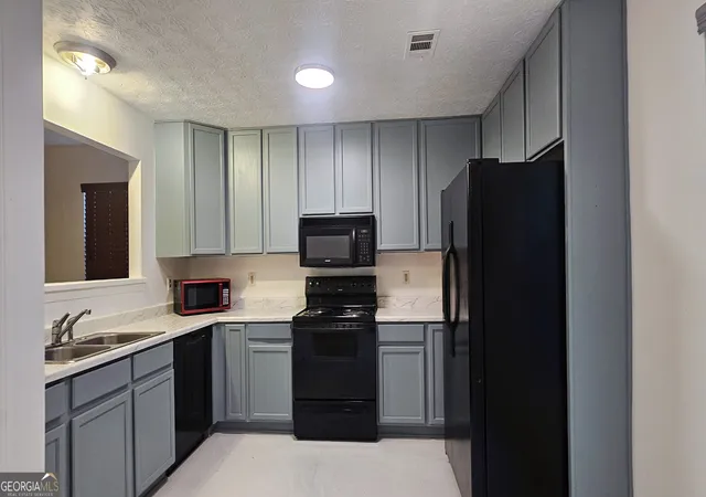 Photo 3 of Single family home for sale at 5851 Giles Rd, Lithonia, GA 30058 | MLS# 10793347 | Listing updated on 2026-08-04