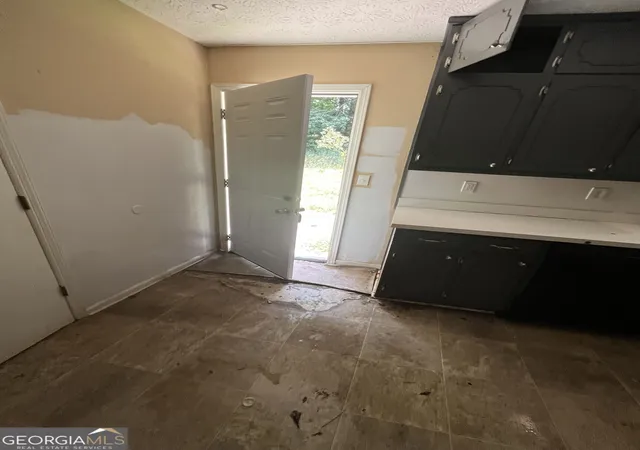 Photo 3 of Single family home for sale at 1077 Walnut Crk Ln, Jonesboro, GA 30238 | MLS# 10829818 | Listing updated on 2026-09-28