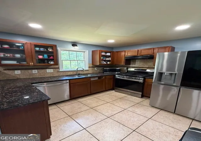 Photo 3 of Sale Pending at 4855 Indian Crst Ct NW, Lilburn, GA 30047 | MLS# 10815217 | Listing updated on 2026-08-14