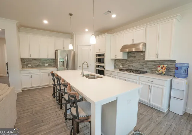 3rd image of 214 Hickory Bluffs Pkwy, Canton, GA 30114 | MLS# 10801725