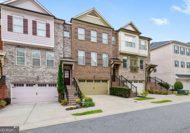 Photo 2 of Townhouse for sale at 9009 Woodland Trl, Alpharetta, GA 30009 | MLS# 10772186 | Listing updated on 2026-06-10