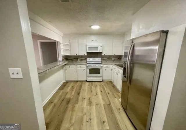 Photo 4 of Sale Pending at 1595 Winston Dr, Macon, GA 31206 | MLS# 10800305 | Listing updated on 2026-08-31