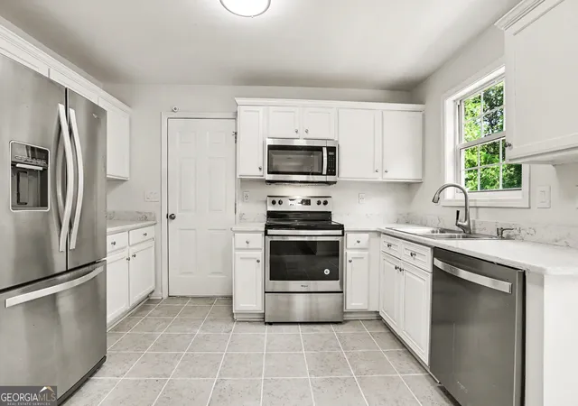 Photo 2 of Single family home for sale at 975 Riverside Walk Xing, Sugar Hill, GA 30518 | MLS# 10781585 | Listing updated on 2026-09-19