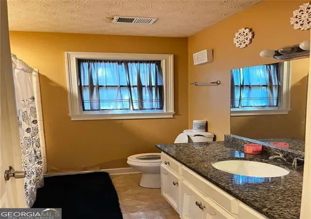 Photo 2 of Single family home for sale at 1501 Shoals Crk Dr Sw, Conyers, GA 30094 | MLS# 10696362 | Listing updated on 2026-06-15