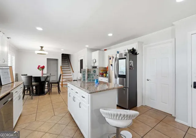 Photo 3 of Single family home for sale at 2021 Oak Branch Way, Stone Mountain, GA 30087 | MLS# 10713190 | Listing updated on 2026-09-03