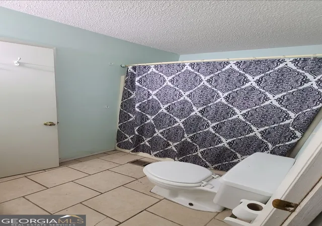 Photo 3 of Multi family home for sale at 213 Woodcrest Cir #APT E, Warner Robins, GA 31093 | MLS# 10836176 | Listing updated on 2026-09-26