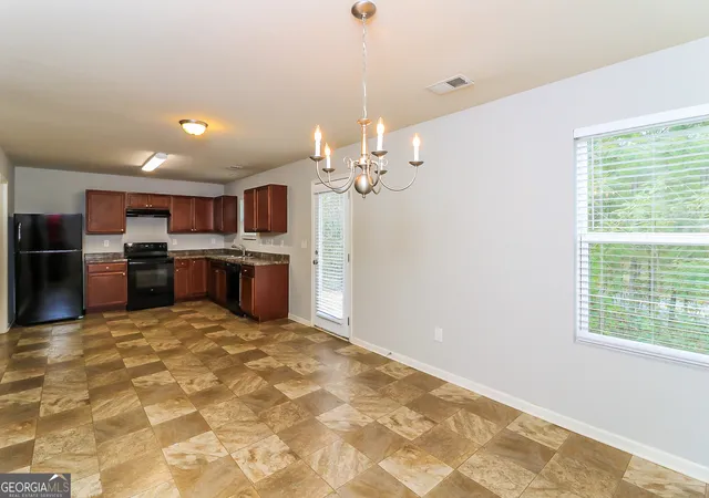 Photo 3 of Single family home for sale at 7103 Tanger Blvd, Riverdale, GA 30296 | MLS# 10729180 | Listing updated on 2026-09-08