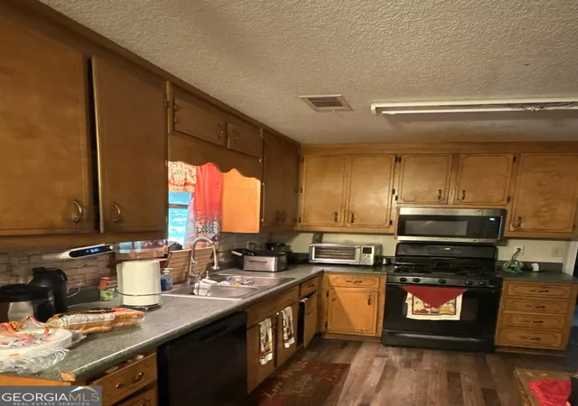 Photo 2 of Single family home for sale at 731 Jefferson Dr Sw, Conyers, GA 30094 | MLS# 10787717 | Listing updated on 2026-08-21