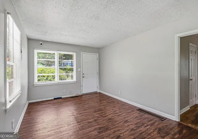 Photo 2 of Single family home for sale at 297 Reed St, Scottdale, GA 30079 | MLS# 10829946 | Listing updated on 2026-09-13