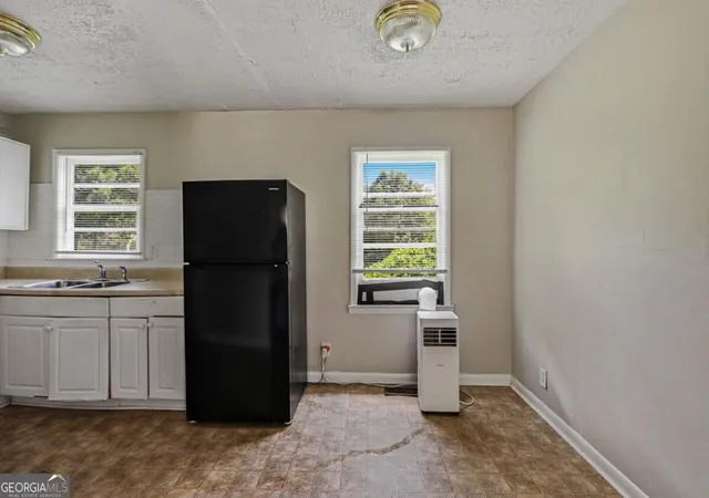 Photo 4 of Single family home for sale at 297 Reed St, Scottdale, GA 30079 | MLS# 10829946 | Listing updated on 2026-09-13