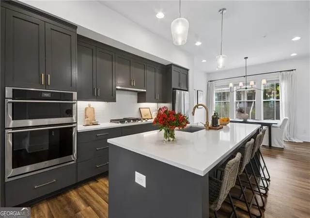 Photo 4 of Townhouse for sale at 1344 Booth Ave Nw, Atlanta, GA 30318 | MLS# 10791962 | Listing updated on 2026-08-26