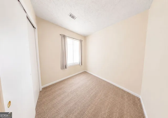 Listing Photo 2 - Condo for sale in building located at 8579 Creekwood Wy, Jonesboro, GA 30238 - Unit #