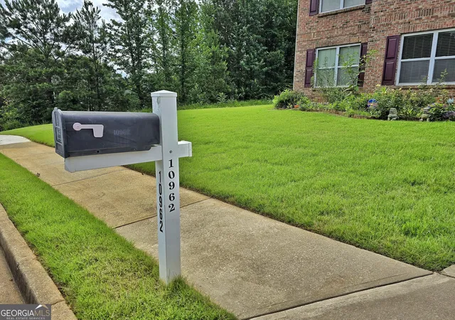 Photo 2 of Single family home for sale at 10962 Southwood Dr, Hampton, GA 30228 | MLS# 10790231 | Listing updated on 2026-08-07