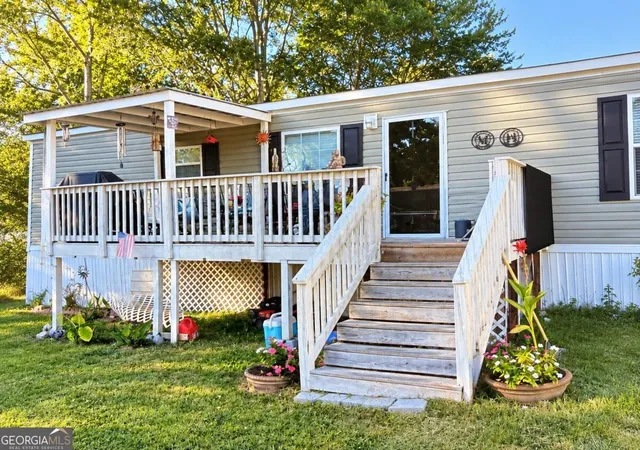 Photo 1 of Manufactured home for sale at 5973 Lights Fry Rd #36, Flowery Branch, GA 30542 | MLS# 10856118 | Listing updated on 2026-10-30