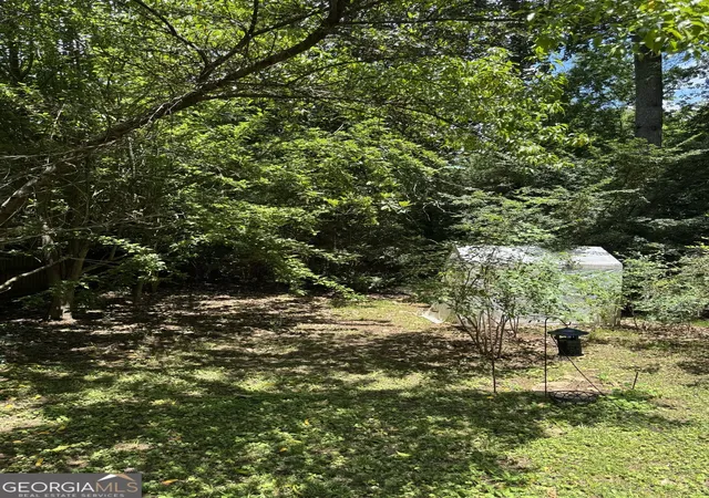 Photo 3 of Single family home for sale at 1154 Kingsley Cir Ne, Atlanta, GA 30324 | MLS# 10822596 | Listing updated on 2026-08-24