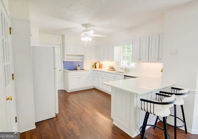 Photo 3 of Sale Pending at 6095 Courtside Dr Nw, Peachtree Corners, GA 30092 | MLS# 10806525 | Listing updated on 2026-08-27