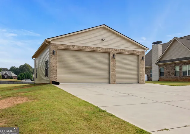 Photo 2 of Single family home for sale at 107 Sweet Bay Cir, Milner, GA 30257 | MLS# 10665949 | Listing updated on 2026-01-27
