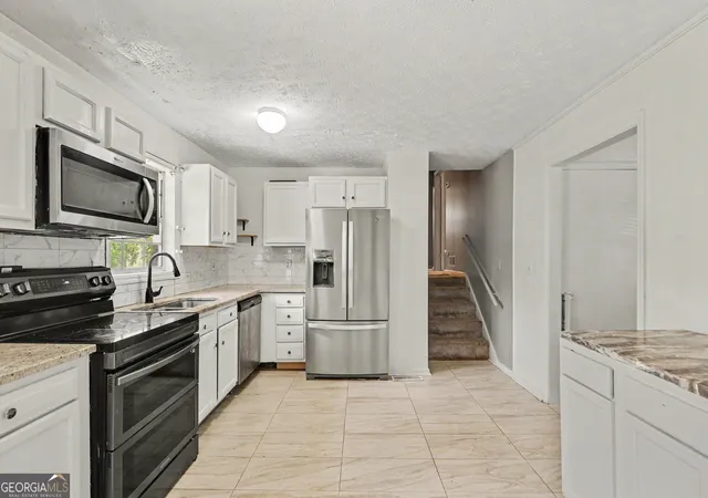 Photo 4 of Single family home for sale at 6184 Marilla St, Douglasville, GA 30135 | MLS# 10822119 | Listing updated on 2026-10-07