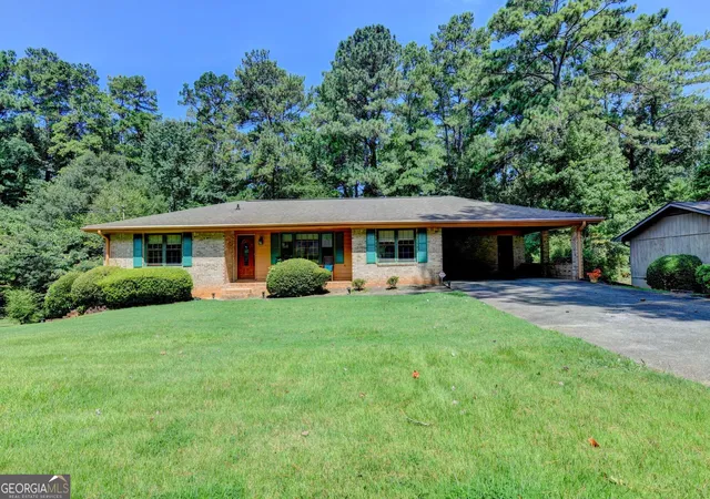 Photo 1 of Single family home for sale at 4061 Whispering Forest Ct Sw, Lilburn, GA 30047 | MLS# 10833987 | Listing updated on 2026-09-16