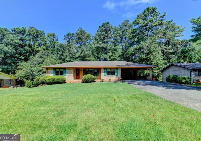 Photo 2 of Single family home for sale at 4061 Whispering Forest Ct Sw, Lilburn, GA 30047 | MLS# 10833987 | Listing updated on 2026-09-16