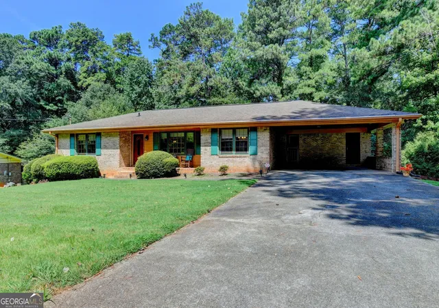 Photo 3 of Single family home for sale at 4061 Whispering Forest Ct Sw, Lilburn, GA 30047 | MLS# 10833987 | Listing updated on 2026-09-16