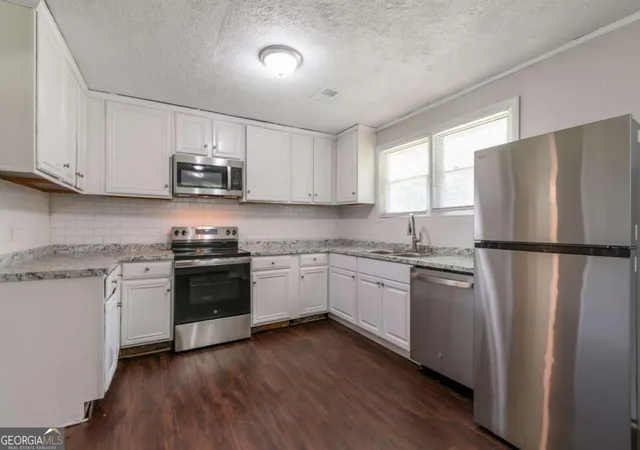4th image of 6414 Shadow Rock Dr, Lithonia, GA 30058 | MLS# 10818754