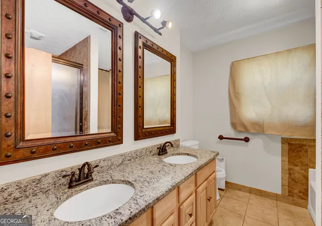 Photo 2 of Single family home for sale at 607 Stonemill Manor, Lithonia, GA 30058 | MLS# 10832679 | Listing updated on 2026-09-08