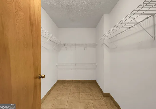 Photo 3 of Single family home for sale at 607 Stonemill Manor, Lithonia, GA 30058 | MLS# 10832679 | Listing updated on 2026-09-08