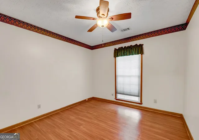 Photo 4 of Single family home for sale at 607 Stonemill Manor, Lithonia, GA 30058 | MLS# 10832679 | Listing updated on 2026-09-08