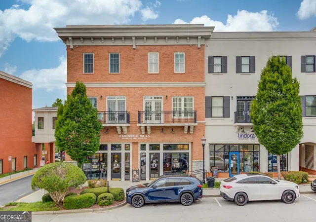 Photo 1 of Condo for sale at 340 Town Ctr Ave #215, Suwanee, GA 30024 | MLS# 10807589 | Listing updated on 2026-09-01