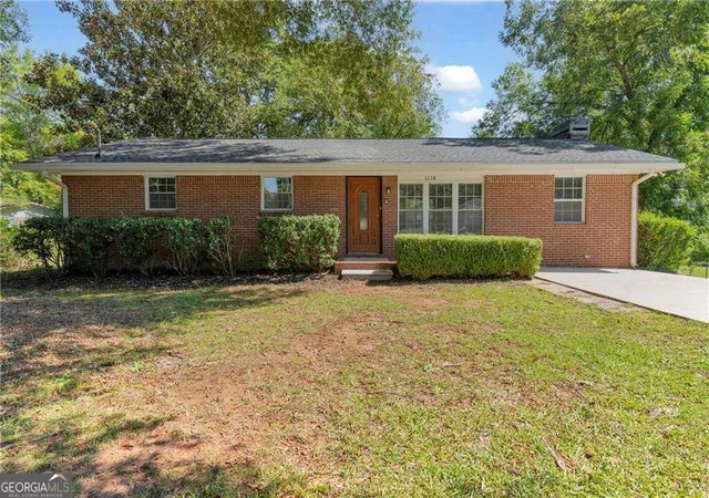 Single family home for sale at 1118 Crestview Cir NE, Conyers, GA 30012 | MLS# 10880632