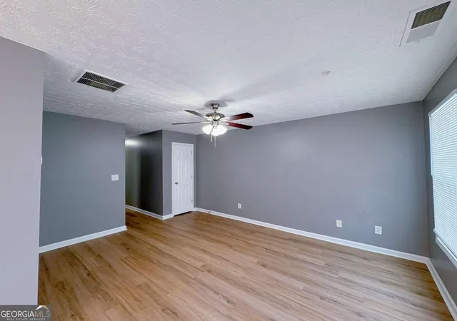 Photo 3 of Townhouse for sale at 1430 Eastmont Dr Nw, Conyers, GA 30012 | MLS# 10777636 | Listing updated on 2026-09-07