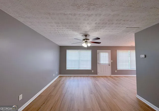 Photo 3 of Townhouse for sale at 1430 Eastmont Dr NW, Conyers, GA 30012 | MLS# 10777636 | Listing updated on 2026-09-07