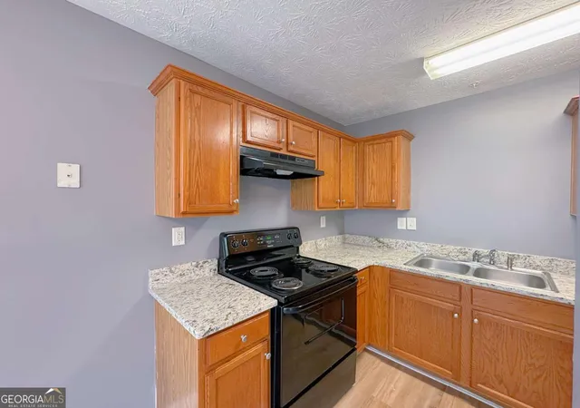 Photo 4 of Townhouse for sale at 1430 Eastmont Dr NW, Conyers, GA 30012 | MLS# 10777636 | Listing updated on 2026-09-07