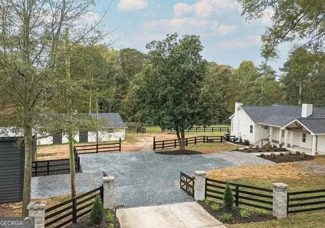 Photo 2 of Single family home for sale at 15585 Thompson Rd, Alpharetta, GA 30004 | MLS# 10726944 | Listing updated on 2026-07-23