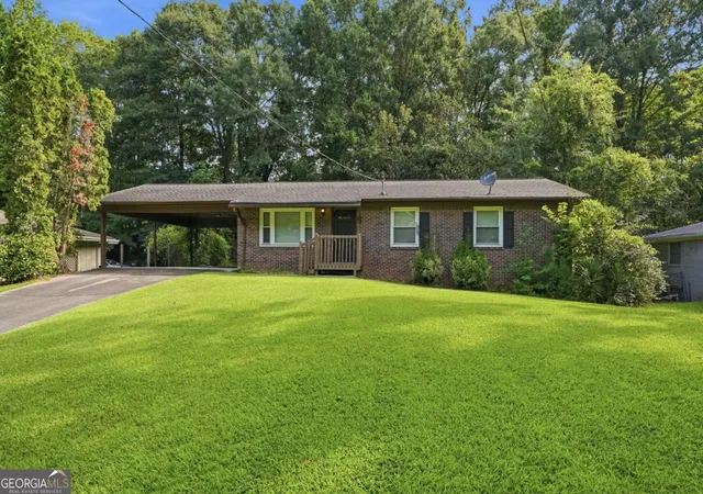 Photo 1 of Single family home for sale at 928 Magna Carta Dr Nw, Atlanta, GA 30318 | MLS# 10825273 | Listing updated on 2026-09-28