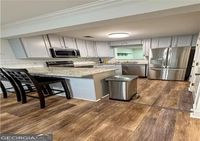 Photo 1 of Townhouse for sale at 230 Peachtree Holw Ct, Atlanta, GA 30328 | MLS# 10848995 | Listing updated on 2026-10-28