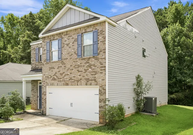 Photo 2 of Single family home for sale at 2024 S Sawgrass Dr E, Hampton, GA 30228 | MLS# 10811881 | Listing updated on 2026-09-14
